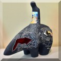 A24. Gene and Rebecca Tobey ceramic bear and rider sculpture. 
